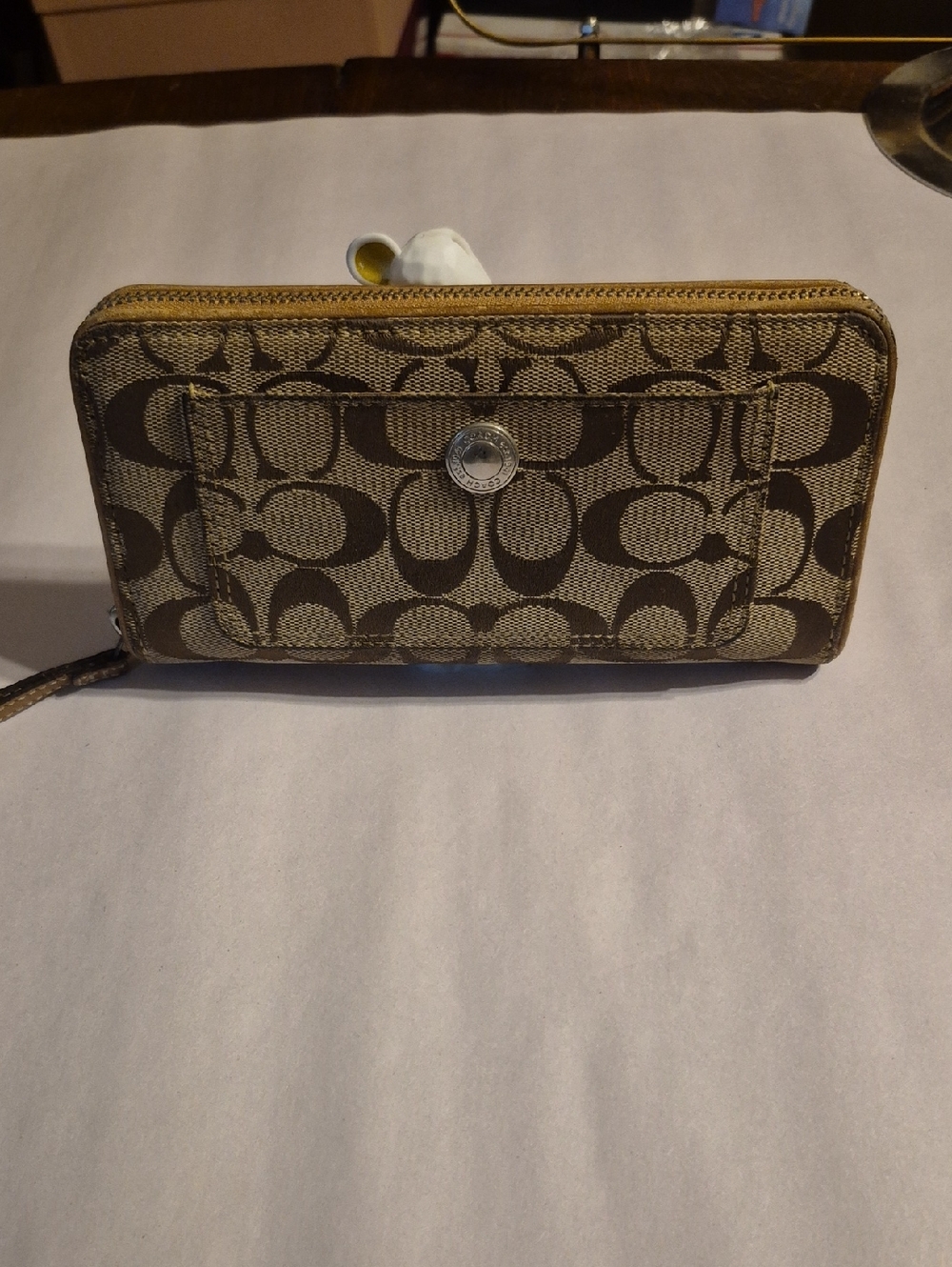 Coach Brown Signature Zip Around Wallet .
